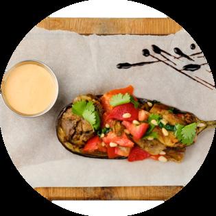 Baked eggplant with pepper and Tomatoes, Served with Paprik Sauce
