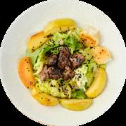 Warm salad with chicken liver, caramelized apples and Brie cheese
