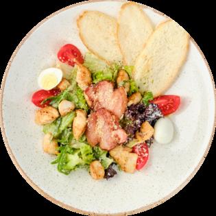 Caesar salad with chicken and bacon
