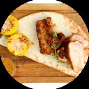 Pork ribs with honey mustard sauce and grilled corn